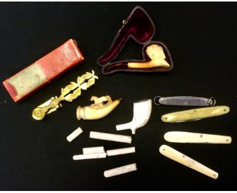 An early 20th century meerschaum pipe, cased;  a sovereign scale balance; pen knives; etc 