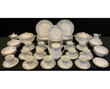 A Hadleigh Fine Porcelain dinner service, the border with flowers in light blue, comprising dinner, dessert and side plates, 