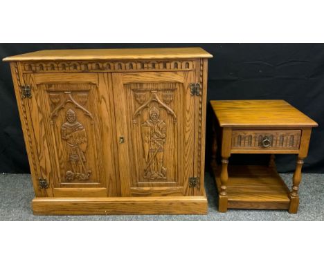A Bespoke-made Jaycee oak side cabinet or cupboard, the pair of doors having panels finely carved with medieval knights, 96cm