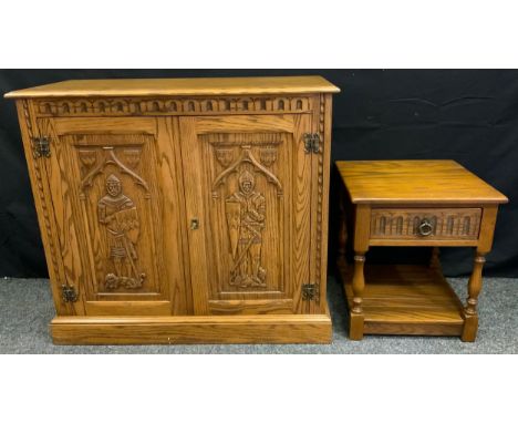 A Bespoke-made Jaycee oak side cabinet or cupboard, the pair of doors having panels finely carved with medieval knights, 96cm