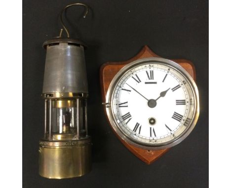 The Wolf Safety Lamp, Wm. Maurice, Sheffield;  a chrome drum clock, Roman numerals, single winding hole, mahogany shield  (2)