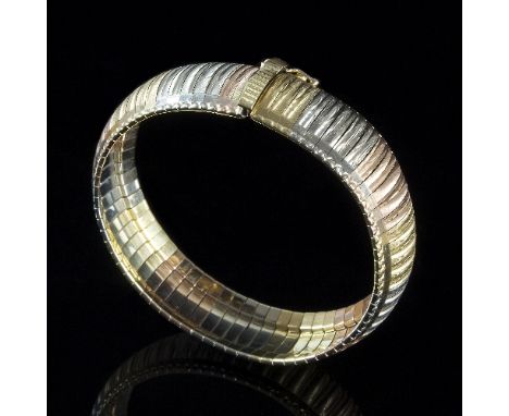 A tri-coloured 18ct gold snake link bracelet with section engine turned thread links, stamped 750, approximately 45gm, 19.5cm