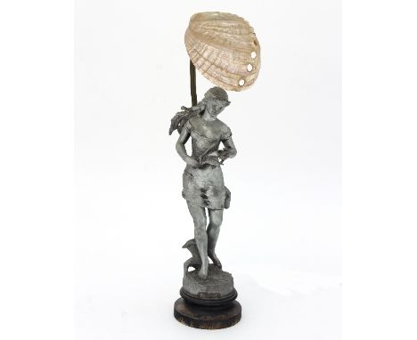 An Art Nouveau figural table lamp modelled in spelter as a maiden holding a lily, signed Detourbet within base, with a mother