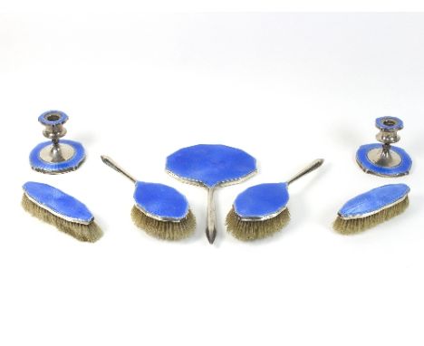 A silver and blue guilloche enamel dressing set, Birmingham 1930, of seven pieces   Condition Report:  Mirror good, glass int