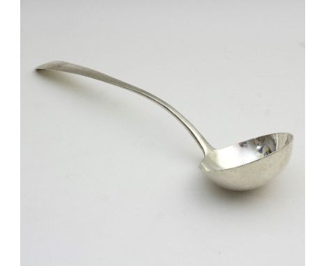 An Irish silver ladle, John Pittar, Dublin circa 1788, the handle with Celtic point, engraved a crest and motto, approximatel