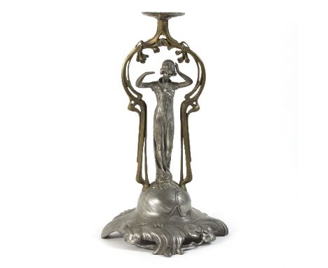 Albert Kohler & Cie, an Art Nouveau figural pewter table lamp, designed as a maiden standing on a foliate base below a sinuou