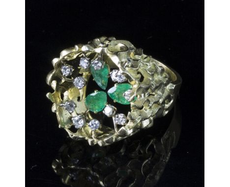 A John Donald ring of modern design, the raised pierced gold mount set internally with emeralds and diamonds, size K/see illu