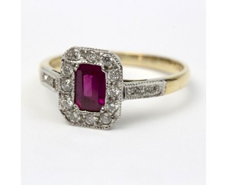 A ruby and diamond dress ring to a white metal and 18ct yellow gold mount, size P