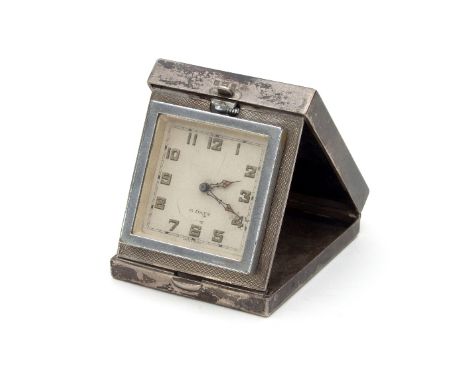 A silver cased folding bedside clock, R&S, Birmingham 1932, with engine turned decoration, 7cm wide