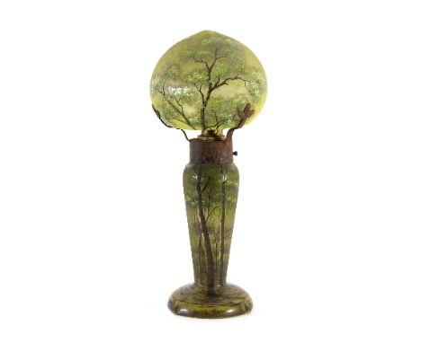 Daum, a cameo glass table lamp, etched and enamelled Summer trees, the base with metal mounts, enamelled mark to underside of