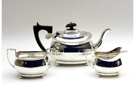 A silver three-piece tea set, S B & S Ltd, Chester 1931, of oblong shape on bun feet, approximately 875gm   Condition Report: