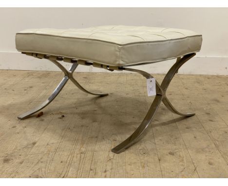 After&nbsp;Ludwig Mies van der Rohe, a vintage 'Barcelona' style footstool in cream faux leather. H40cm.&nbsp;
