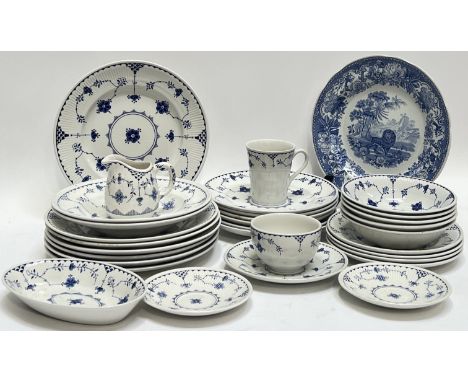 A quantity of Mason's Denmark pattern blue and white crockery in the Royal Copenhagen style comprising seven dinner plates (w