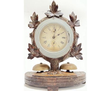 A German Junghans carved oak striking clock (operation unconfirmed) with white dial, two sub-dials, and Roman numeral indices