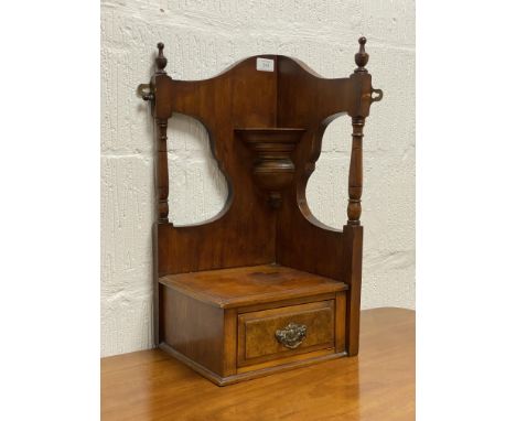 A late Victorian walnut corner shelf, with ring turned finials flanking vase stand and above a drawer. H52cm.&nbsp;