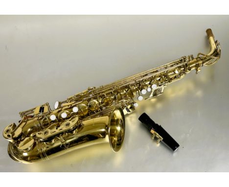 A Symphony Alto brass saxophone model LSA14756 with mouth piece and mother of pearl inset buttons and hard shell Symphony cas