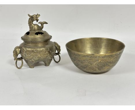 A modern Chinese cast brass bowl with scenes of dragon and phoenix&nbsp; signed verso with six character seal mark H x 12cm D