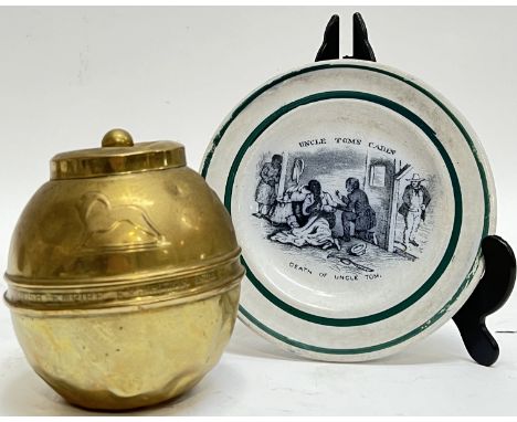 An unusual Victorian transfer printed dish with scene from Uncle Tom's Cabin, together with a Lipton's tea caddy souvenir fro