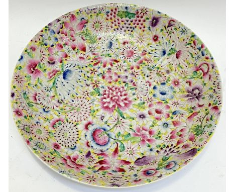 A large Chinese porcelain polychrome enamelled mille fleur/ thousand flower pattern dish/bowl (apocryphal four-character kang
