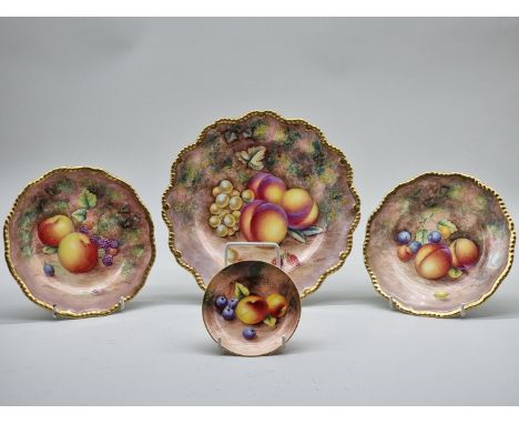 A Royal Worcester fruit painted cabinet plate,&nbsp;by H Ayrton, signed, 23cm diameter; together with a further smaller pair,
