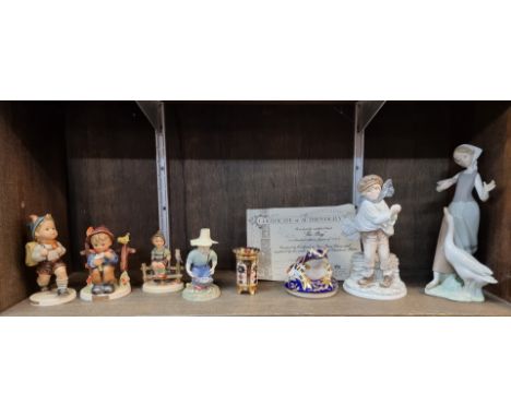 A small group of figures and similar, comprising: Hummel; Royal Worcester; Royal Crown Derby; Lladro and Coalport, largest 23