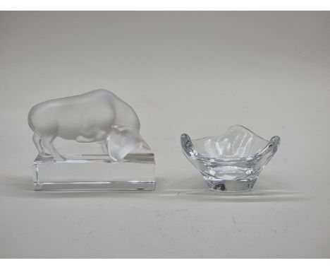 A Lalique frosted glass bull, 11cm wide, together with a small Daum glass dish, 9cm wide. (2) 