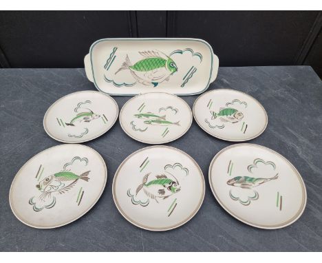 A Poole pottery fish and sandwich set, circa 1952-55,&nbsp;largest 41.5cm wide. (7) 