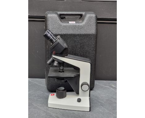 A Leitz HM-LUX 3 binocular microscope,&nbsp;in fitted case. 