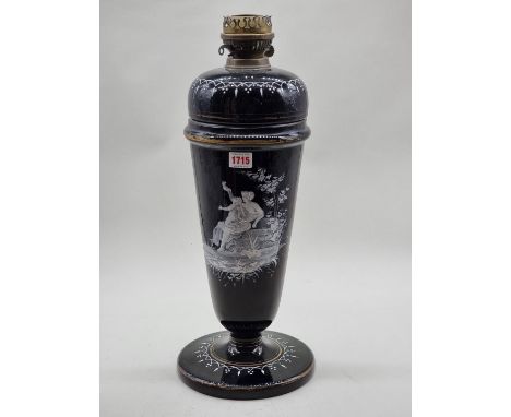 A Victorian Mary Gregory black glass oil lamp,&nbsp;total height 53cm, (repaired). 