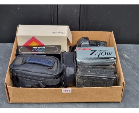 Cameras:&nbsp;a Polaroid SX-70 Land Camera, boxed and with instructions; and others.&nbsp;&nbsp; 