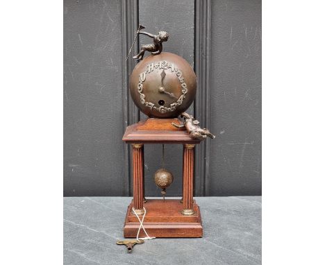 A Junghans mahogany and brass globe clock, 30.5cm high.&nbsp;&nbsp; 