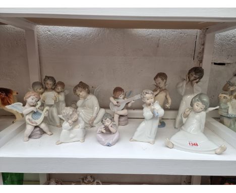 Ten Lladro figures of Angels,&nbsp;largest 22.5cm high, (loss to one wing). (10) 