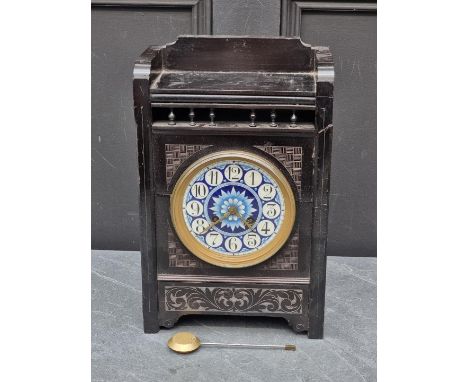An Arts &amp; Crafts ebonized mantel clock,&nbsp;attributed Lewis Foreman Day, the painted dial inscribed 'Elkington &amp; Co