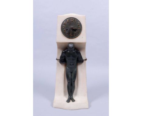   Jugendstil-Tischuhr, wohl Lenzkirch, um 1910/20   hochrechteckiger Korpus, schauseitig plastischer Männerakt in Ketten, run