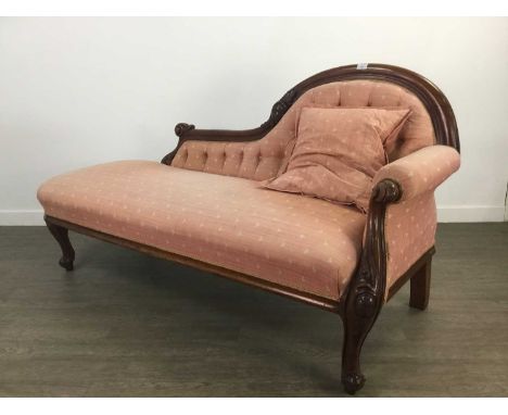 VICTORIAN MAHOGANY FRAMED CHAISE LONGUE,with foliate carved toprail, button-back upholstery, further carved knee to cabriole 