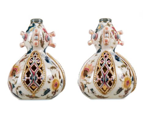 PAIR OF ZSOLNAY PECS POLYCHROME VASES,of double gourd form, with enamelled and gilt highlighted floral decoration, bearing mo