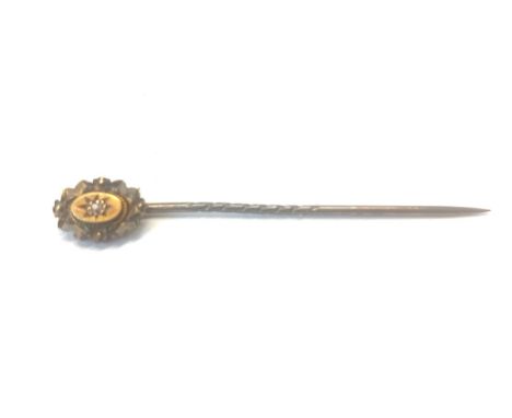 Small 15ct gold diamond stick pin 