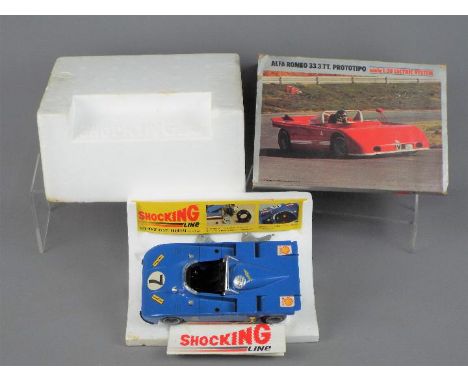 Edison Giocattoli - An interesting boxed diecast 1:20 scale Alfa Romeo 33.3TT Prototipo 'Shocking Line'. The model appears to