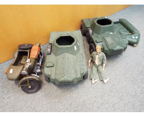 Cherilea, Irwin, Palitoy - An unboxed Palitoy 'Action Man' together with a collection of four unboxed plastic vehicles suitab