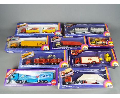 Siku - Nine boxed diecast model vehicle by Siku. Lot contains #3115 Renault Lorry &amp; Trailer - BMX; #2918 Ford Cargo Deliv