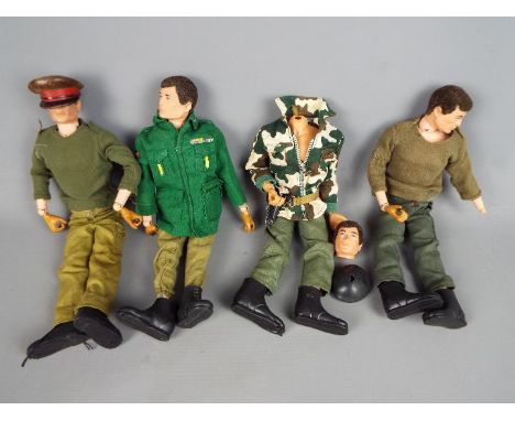 Palitoy - Four unboxed vintage 'Action Man' figures by Palitoy. All four have flock hair and gripping hands and are clothed i