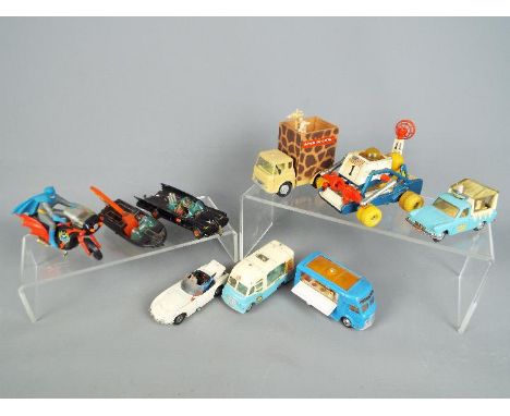 Corgi Toys - A collection of nine unboxed diecast model vehicles by Corgi. Lot includes #336 James Bond Toyota 2000 GT; #267 