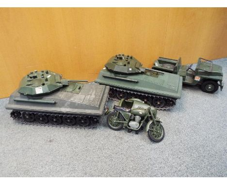 Palitoy - Four unboxed vintage 'Action Man' vehicles by Palitoy. Lot contains an 'Action Man' Land Rover, a Motorcycle Combin