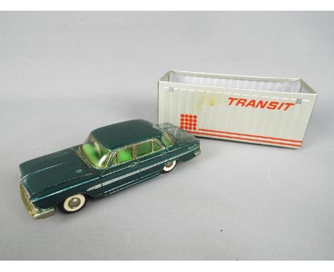 Taiseiyaco - a 1;43 diecast model of a Nissan Gloria Deluxe by the Japanese manufacturer Taiseiyaco. The model in green with 