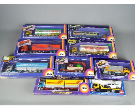 Siku - Nine boxed diecast model vehicle by Siku. Lot contains 3418 Kenworth Semi Tanker - BP; #3417 MAN Coach; #2920 Recyclin