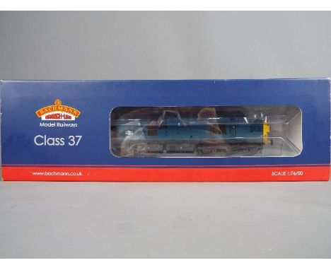 Bachmann - A boxed DCC ready Bachmann 32-781A Class 37/0 Diesel Locomotive Op.No.37034 in Weathered BR Blue livery. The model
