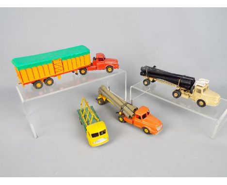 French Dinky Toys - A collection of four unboxed French Dinky Toys. Lot consists of Simca Cargo 'Saint Gobain' Glass Truck; #