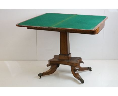 William IV Rosewood Card Table, the rectangular fold-over top opening to a green Basie playing surface, raised on a square ta