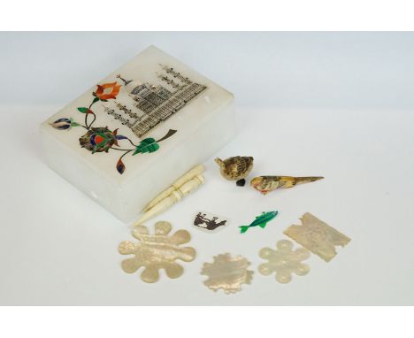 A small group of collectables to include mother of pearl gaming counters and bone cribbage markers within an ornate soapstone