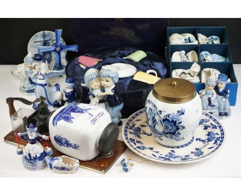 Collection of Dutch Delft ceramics to include a wall-mounted coffee grinder, shoe ornaments, windmill, figure groups, biscuit
